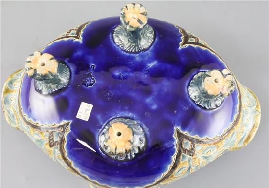 Frank A Butler for Doulton, a rare quatrefoil dish on four paw feet, dated 1882, W. 28cm, restoration